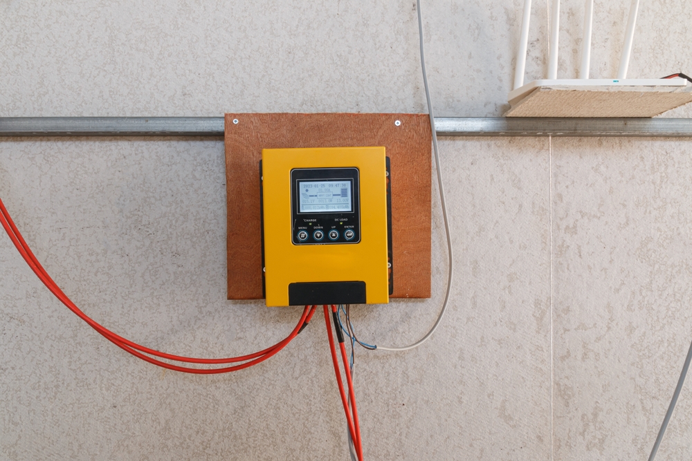 a yellow solar charge controller with wiring